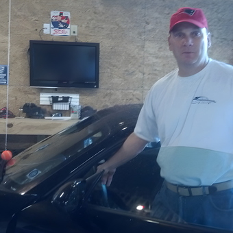 Organized Garage With Workbench, Tools, TV, and Car - Tim from Adams, MA