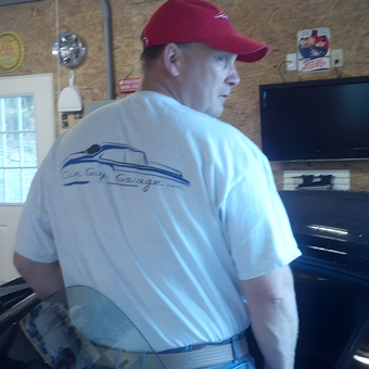 Organized garage with TV, workbench, and car - Tim from Adams, MA