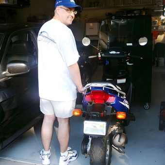 Organized Garage with Motorcycle and Storage Cabinets - WD Mallard from Jacksonville, FL