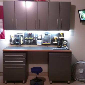 Modern garage workbench with storage cabinets and pegboard - Brett from Edmond, OK