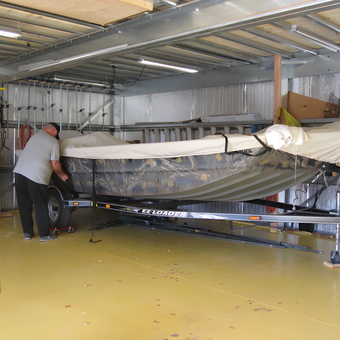 Organized garage with boat trailer, tools, and storage - Bob from Baker City, OR