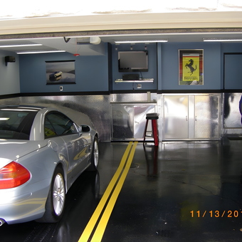 Modern garage with diamond plate cabinets and wall art - Tom from McMurray, PA