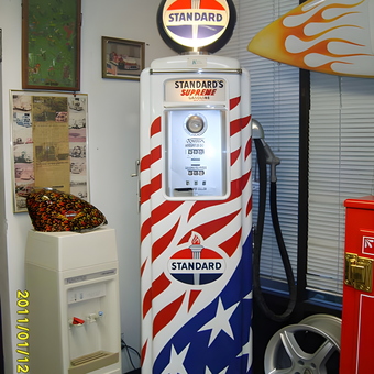Patriotic Standard Gas Pump Decor in Garage - John Hartman