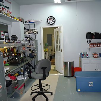 Organized garage with workbench, storage bins, and cabinets - Rick from Virginia Beach, VA