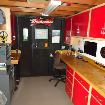 Organized garage with red cabinets and workbench - Dave from Jackson, MI