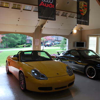 Luxury Garage with Porsche Cars and Banners - Doug from Redmond, WA