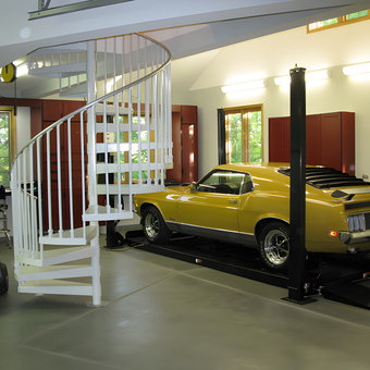 Garage with Car Lift, Cabinets, Spiral Staircase - T. from New Lenox, IL