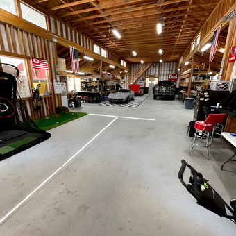 Spacious garage with cars, workbenches, and flags - Walt from Petaluma, CA