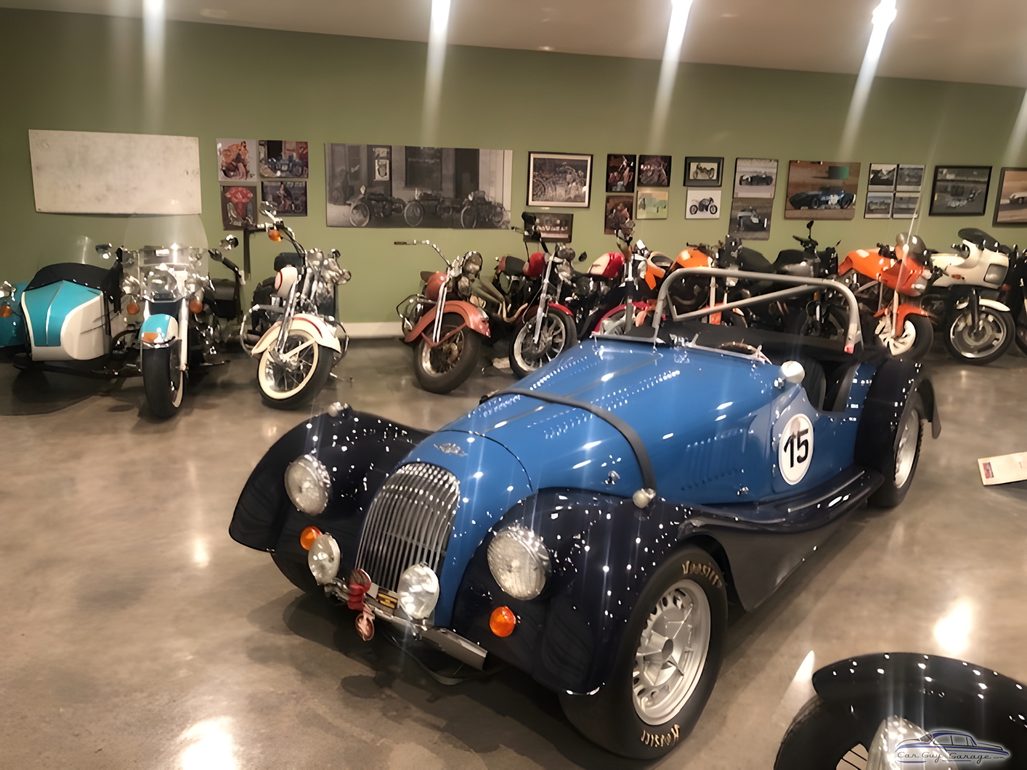 Classic blue roadster and vintage motorcycles display - Jason from Arroyo Grande, CA