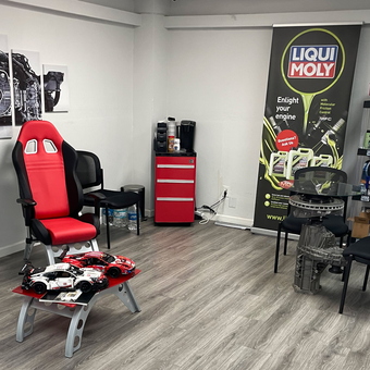 Garage Waiting Area with Racing Chairs and Auto Decor - Rulo from San Antonio, TX