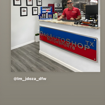 Clean garage office with counter display and wall plaques - Rulo from San Antonio, TX