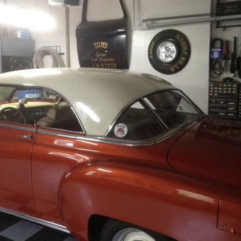 Classic car, garage wall art, and Goodyear tire display - Tom from East Longmeadow, MA