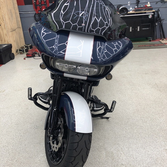 Custom motorcycle in organized garage with cabinets - The Godfather from Peabody, MA