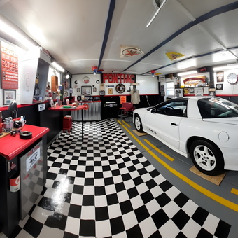 Classic car garage with checkered floor and wall decor - Mike from Bucyrus, OH