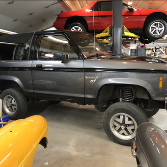 Classic Bronco II and Car Lift in Organized Garage - Connie from Brighton, MI