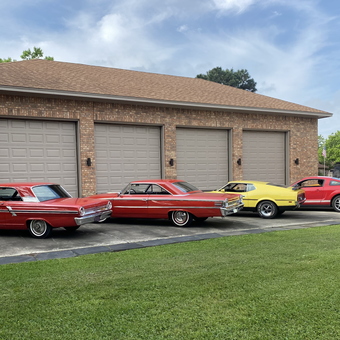 Classic and Modern Cars Parked by Brick Garage - Don from Baytown, TX