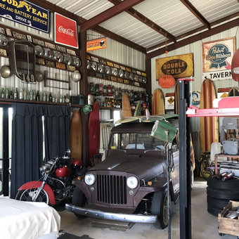 Vintage Garage Decor with Classic Car Lift and Signs - Jeff from BASTROP, TX