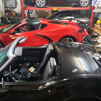 Classic and Modern Sports Cars with Red Car Lift - John from Holly, MI