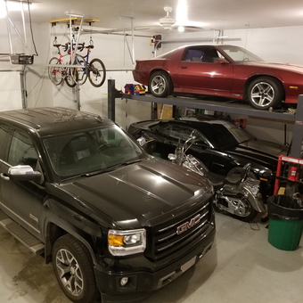 Garage with Car Lift, GMC Truck, Motorcycles, and Bikes - Jason from Watertown, SD