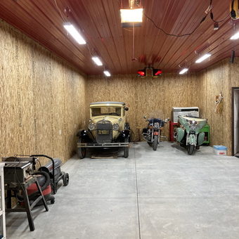 Classic Car and Motorcycles in Well-Lit Garage - Wag from Larned, KS