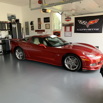 Red Corvette in Organized Garage with Wall Decor - Jeff from Berryton, KS