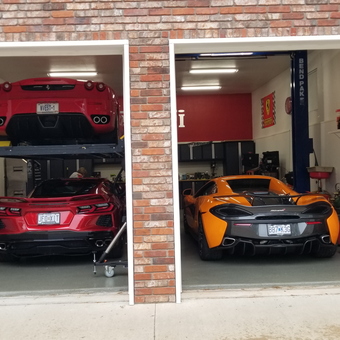 Luxury Sports Cars on Lifts in Organized Garage - Mike from Joplin, MO