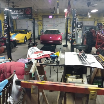 Garage with Car Lift, Workbench, and Tools - Quicktoy from Comklin, MI