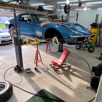 Garage with car lift, jack stands, and creeper - Phil from Ofallon, MO