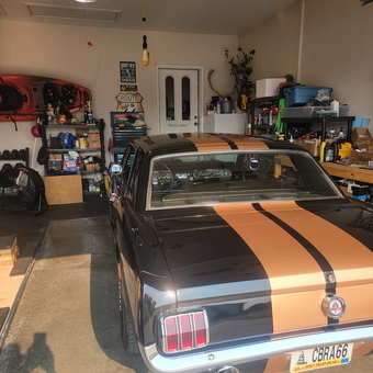 Organized garage with classic car, shelves, and storage - Jon from Saint Robert, MO