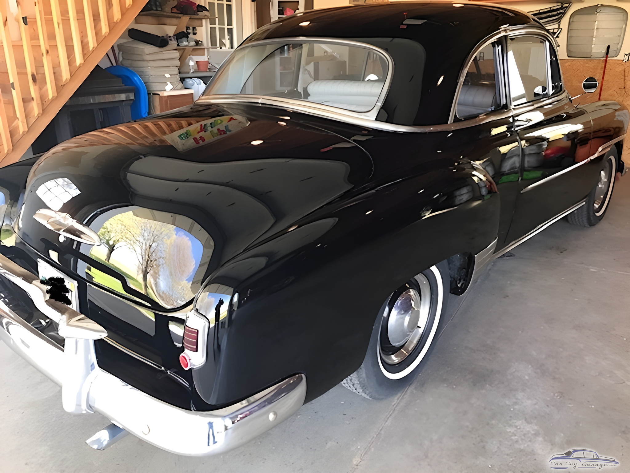 Classic Black Car in Organized Garage - Brandon from Angola, IN