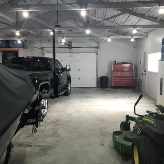 Organized garage with tool chest and vehicles - carguy from Clayton, IN
