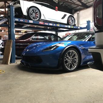 Multi-car garage with Pro Lift and sports cars - VJ from Booker, TX