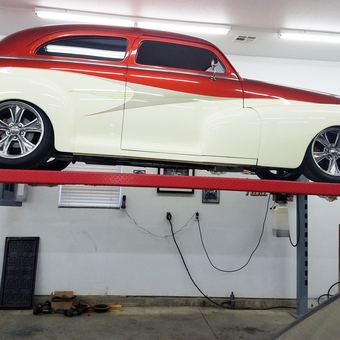 Classic car on four post lift with garage storage - David from Wichita, KS