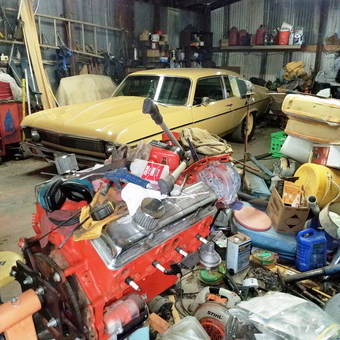 Classic Car, Engine Block, and Tools in Busy Garage - L from Arkansas city, KS