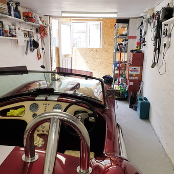 Classic Car Garage with Tools and Storage Shelves - John