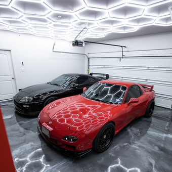 Modern garage with hexagon LED lights and epoxy floor - Christian from Richmond, TX