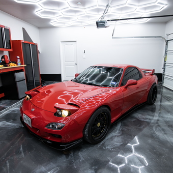 Modern garage with hex LED lights and storage cabinets - Christian from Richmond, TX