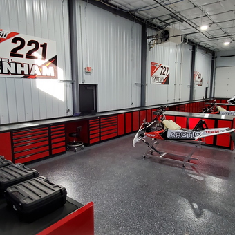 Red Tool Cabinets and Workbenches in Racing Garage - All Finish Racing