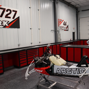 Red Garage Cabinets and Arctic Snowmobiles - All Finish Racing