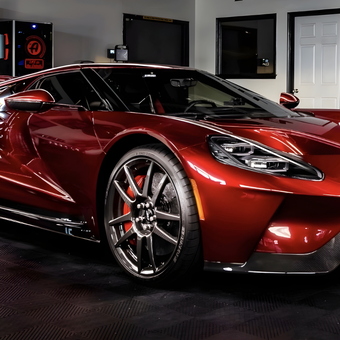 Luxury garage with supercar, cabinets, and tool chest - JD
