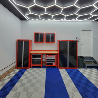 Modern garage with LED lights, cabinets, and tile flooring - Dan from Mckees Rocks, PA