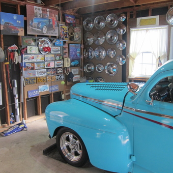 Classic Car Garage with Hubcap Wall and Signs - Dale from Red Hill, PA