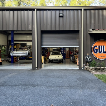 Classic Car Garage with Lift and Gulf Sign - Dave from KEYSTONE HGTS, FL