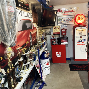 Classic Garage Decor With Mobil Pump and Trophies - Dick from NY