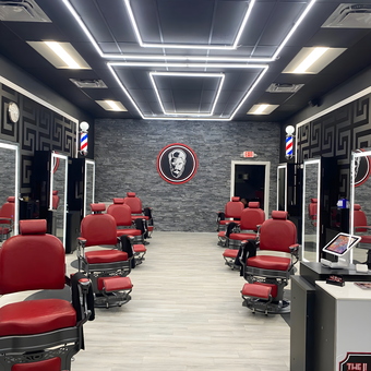 Red Vintage Barber Chairs and Modern Lighting - The Hairy Bastard Barbershop in Fort Lauderdale