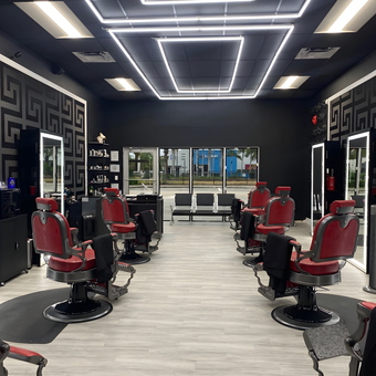 Modern Barbershop with Red Chairs and LED Lighting - The Hairy Bastard Barbershop in Fort Lauderdale