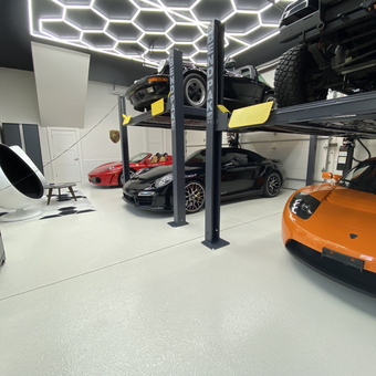 Luxury Garage with Car Lift, Tool Cabinet, and Modern Lighting - Arman from Atlanta, GA