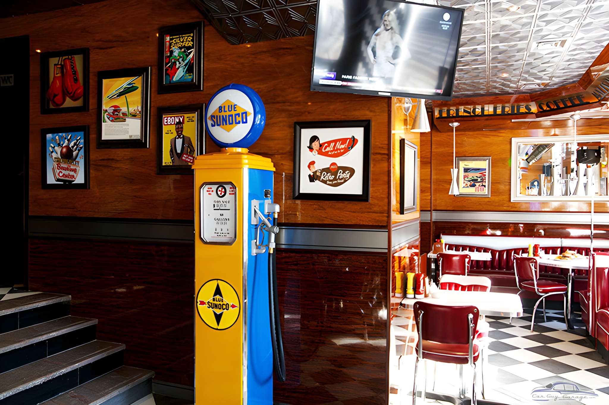 Retro diner with vintage gas pump and wall art - Retro Diner