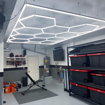 Modern garage with LED lighting, storage bins, and tools - Darwin from San Bruno, CA