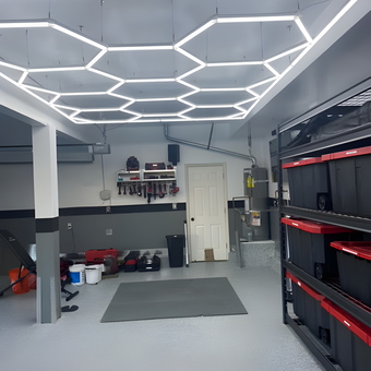 Modern garage with LED hex lights and storage bins - Darwin from San Bruno, CA